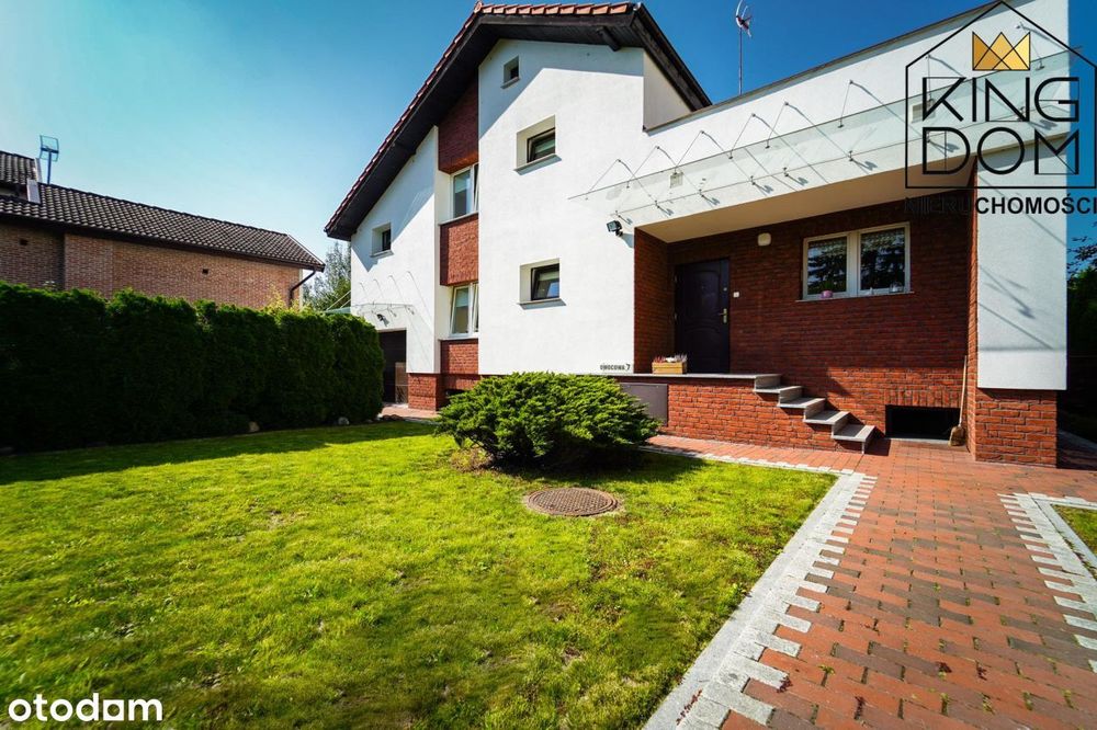 Ekonomiczny dom jednorodzinny z ogrodem i garażem