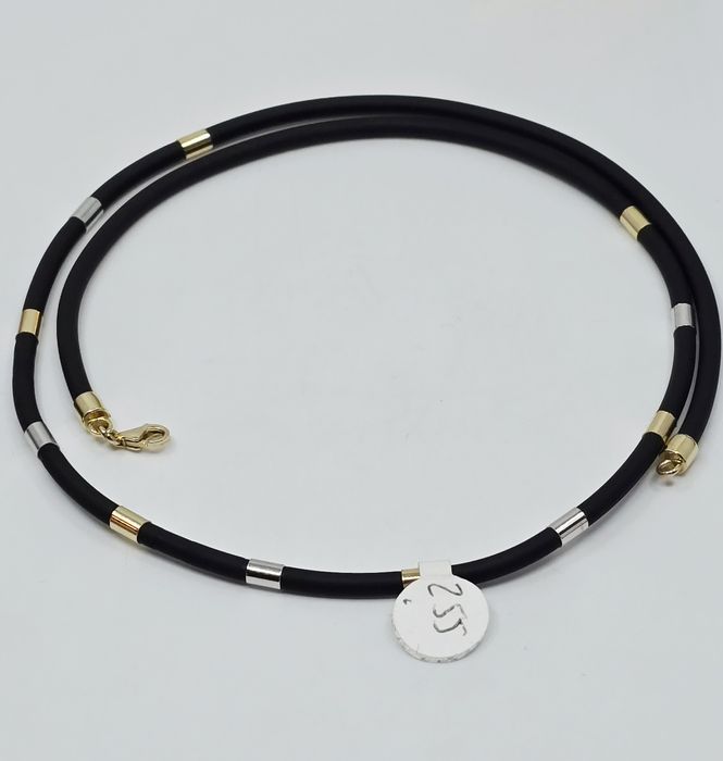 Naszyjnik na kauczuku ze złotymi elementami próba 585 14k 
- Waga: g