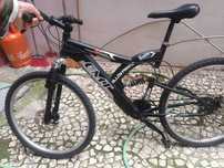 Bicicleta EMT com suspensão
