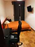 Quarto em apartamento familiar