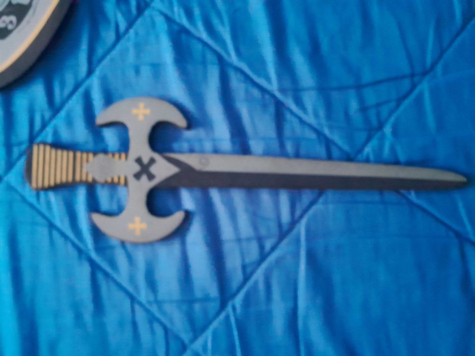 Capa, espada e escudo