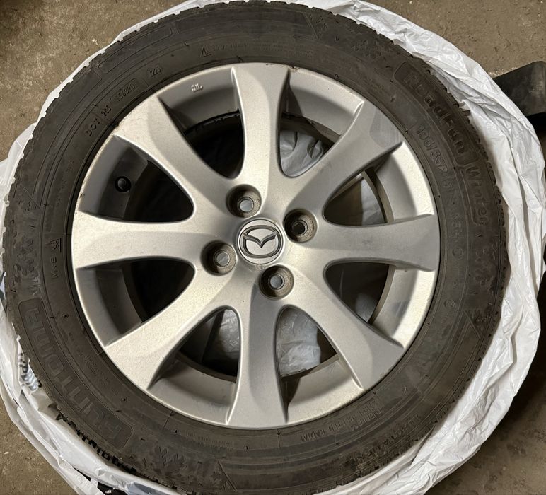 Оригінальні диски Mazda R15 та зимові шини