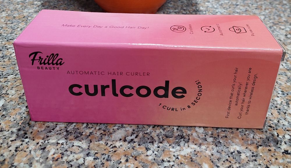 Aparelho de encaracolar o cabelo