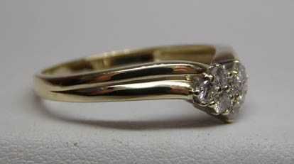 Złoty pierścionek z diamentami brylanty 0,31 ct.