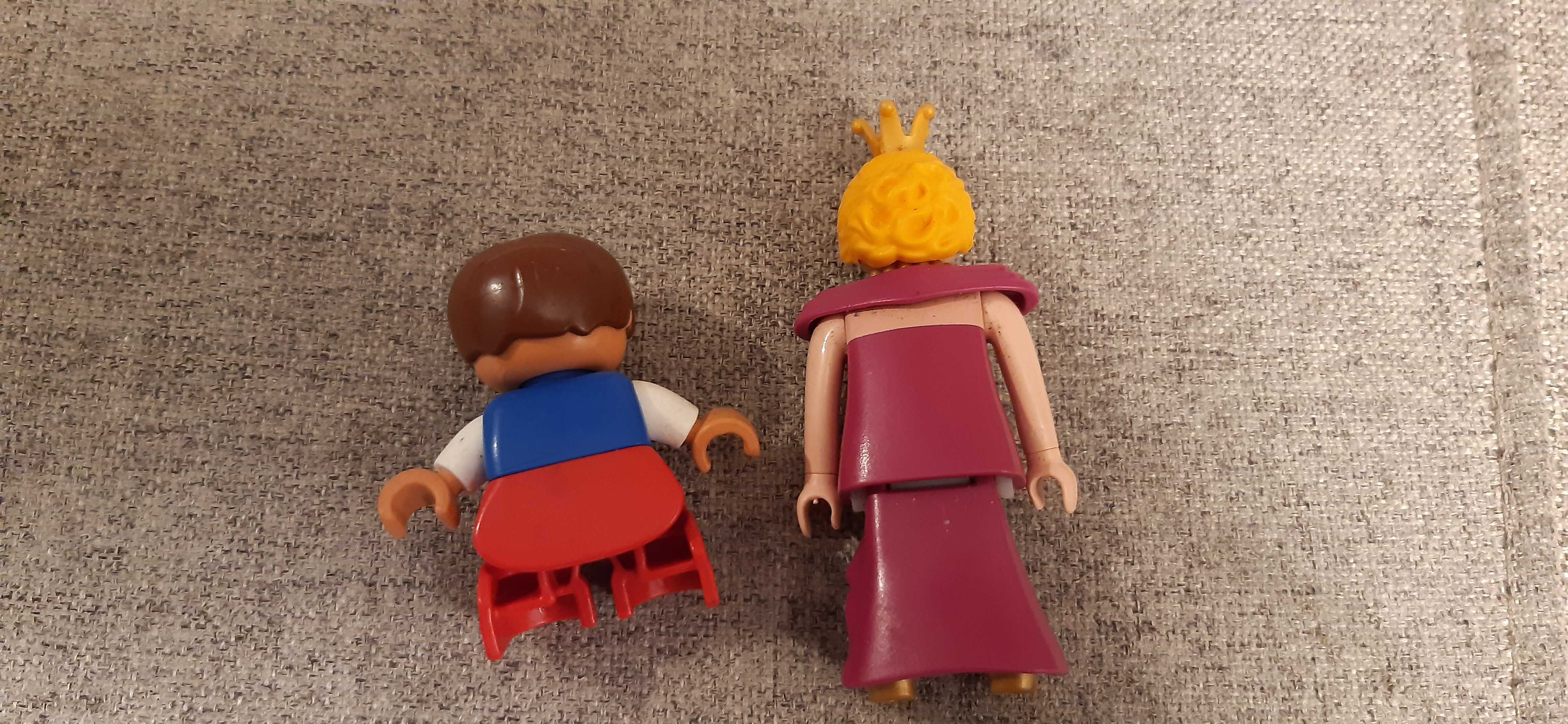 2 figurki, chłopczyk lego duplo i księżniczka playmobil