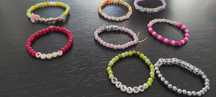 Pulseiras swiftie, festivais e personalizadas
