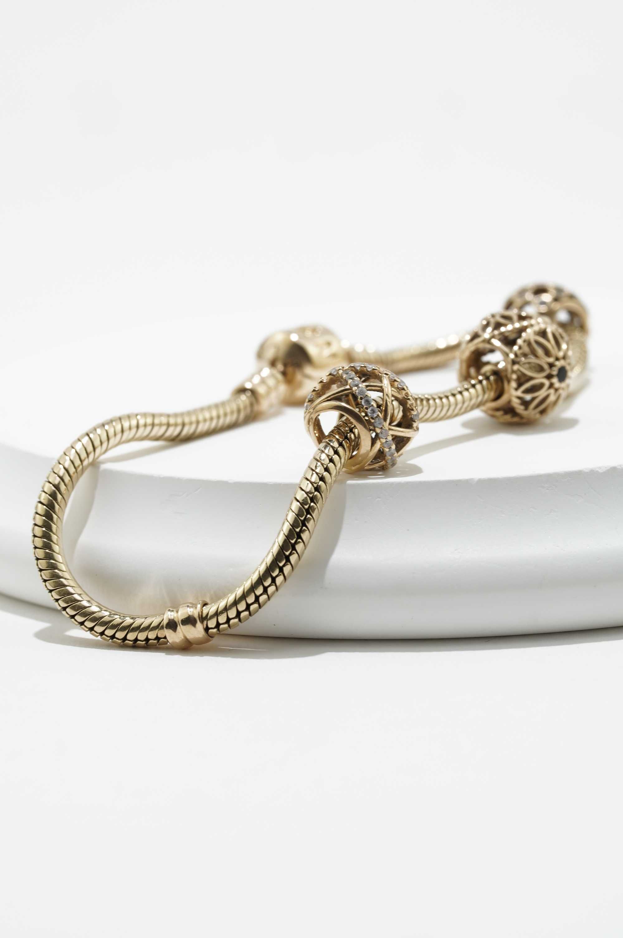Złota bransoletka Pandora 14K 22,65g