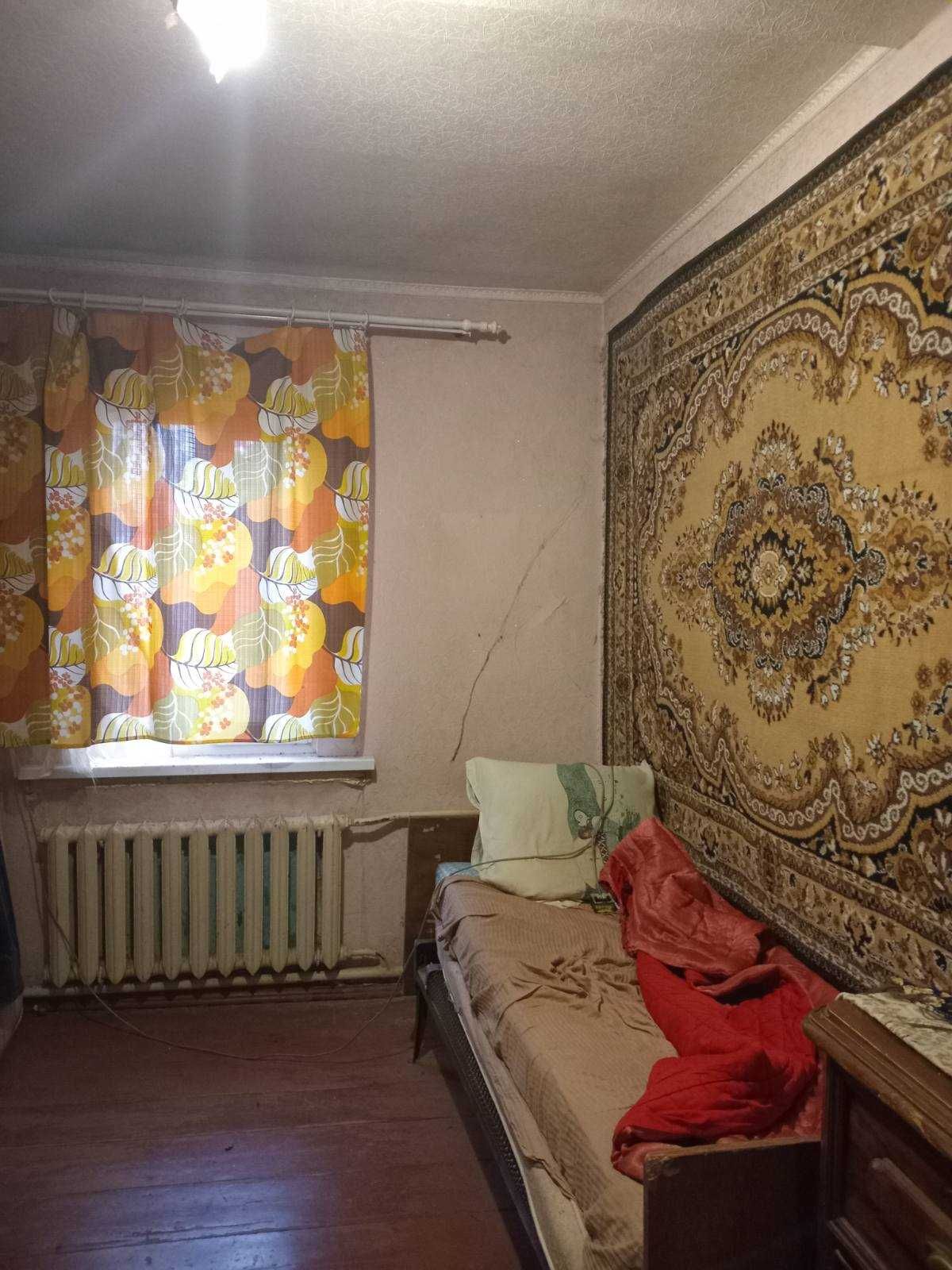 Продам часть дома в Люботине (центр Водяне) с удобствами