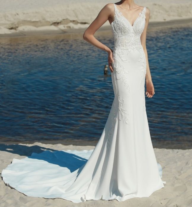 Suknia ślubna z trenem z salonu Gala