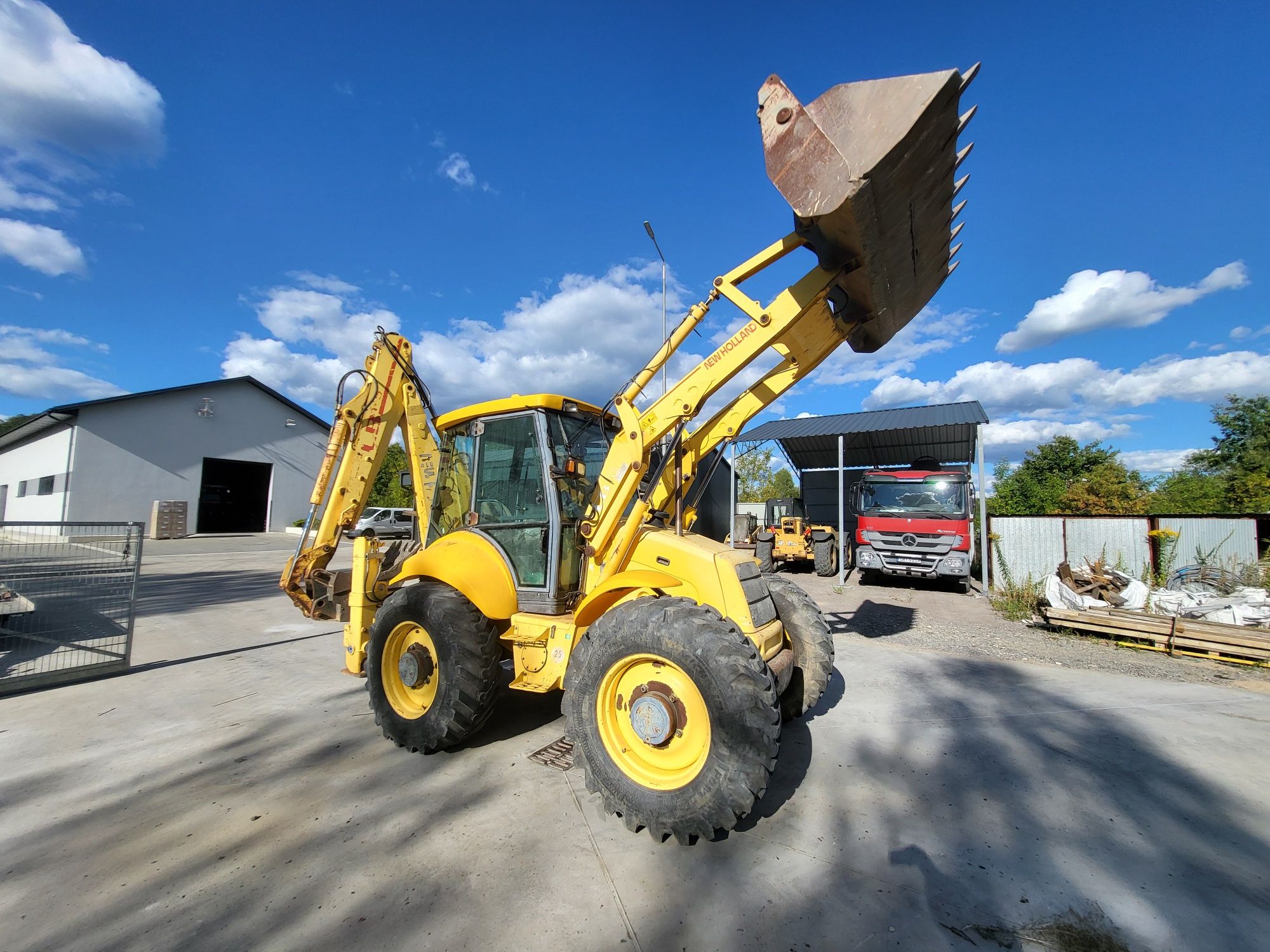 New holland lb 115 klima powershift koparko ładowarka