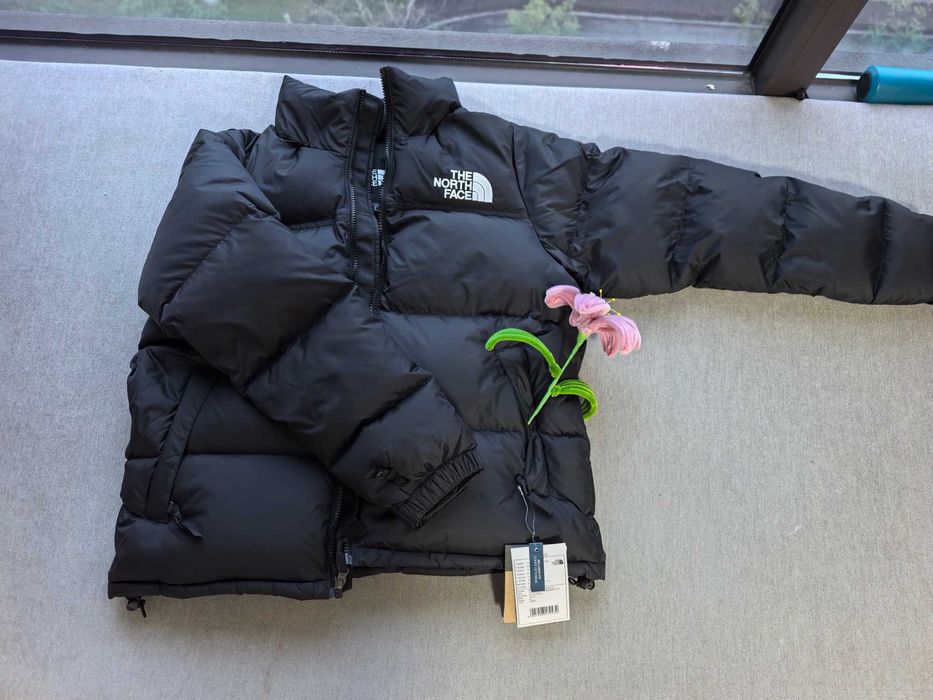 Czarny uniwersalny kurtka puchowa – modna i ciepła!