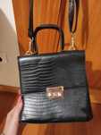 Bolsa preta com alça
