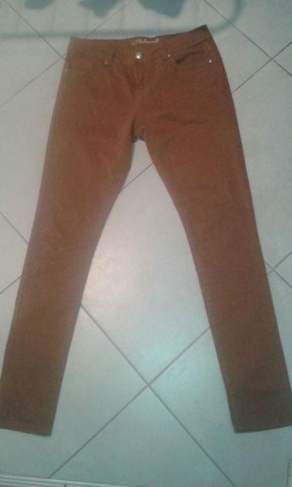 Spodnie rurki jak nowe r.40