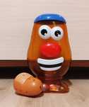Pojemnik na zabawkę ziemniak, bulwa. Toy Story. Można doczepiać elem.