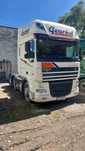 Сідельний тягач DAF XF105.460 під напівпричіп самосвал правий руль
