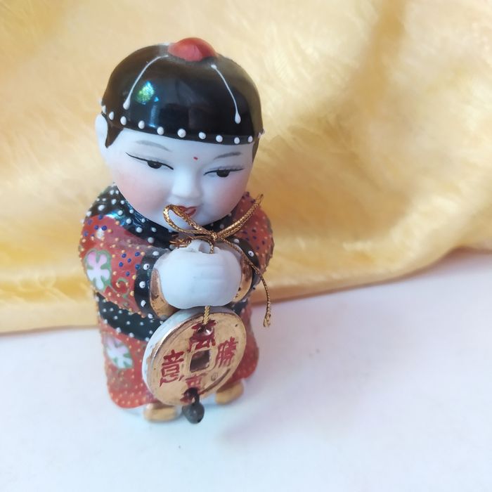 Продам статуетку китайця