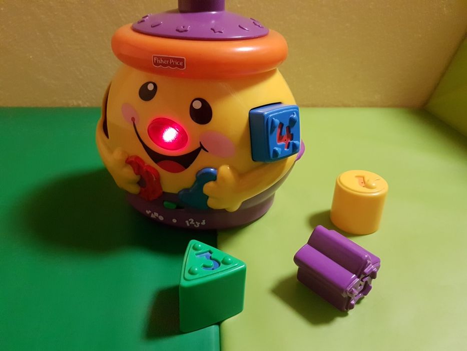 Garnuszek na klocuszek Fisher Price sorter kolorów liczb