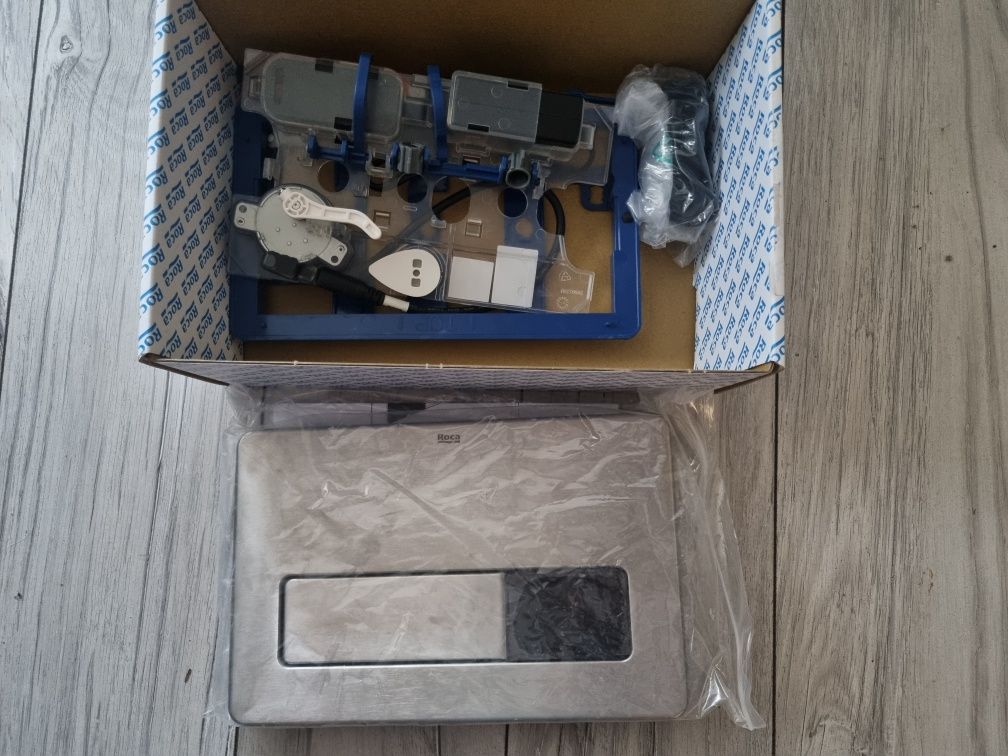 Roca PL3-E One przycisk spłukujący elektroniczny inox