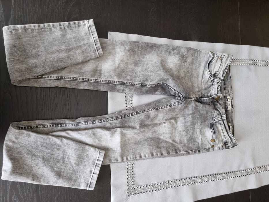 Sprzedam paczkę 10 par spodni roz. 36