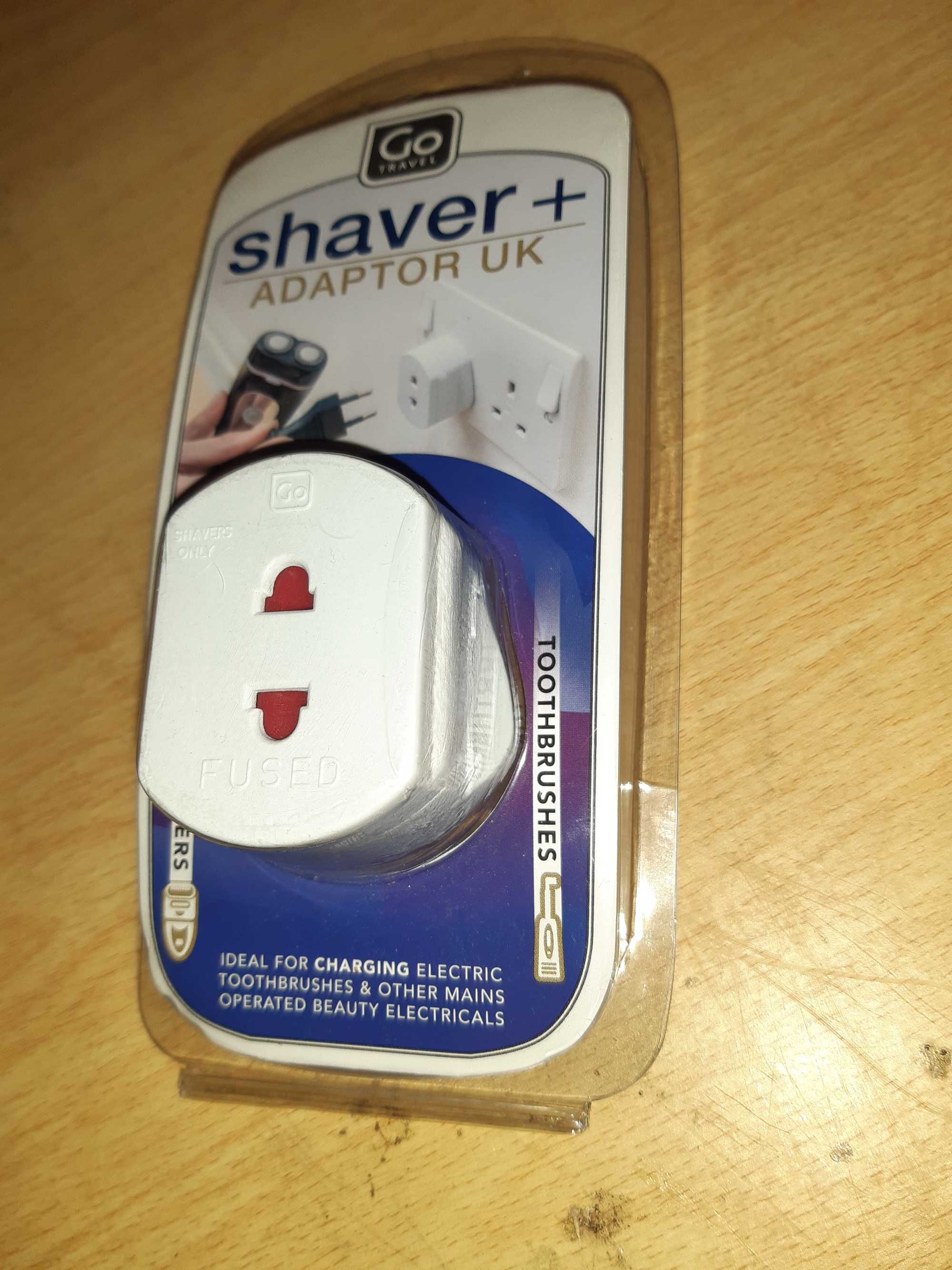 Adaptor / przejściówka/ prądu z EU do UK, nowy.