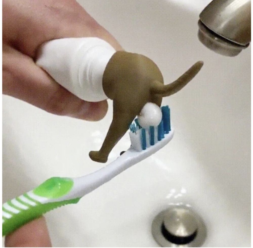 Насадка для зубной пасты в форме собаки