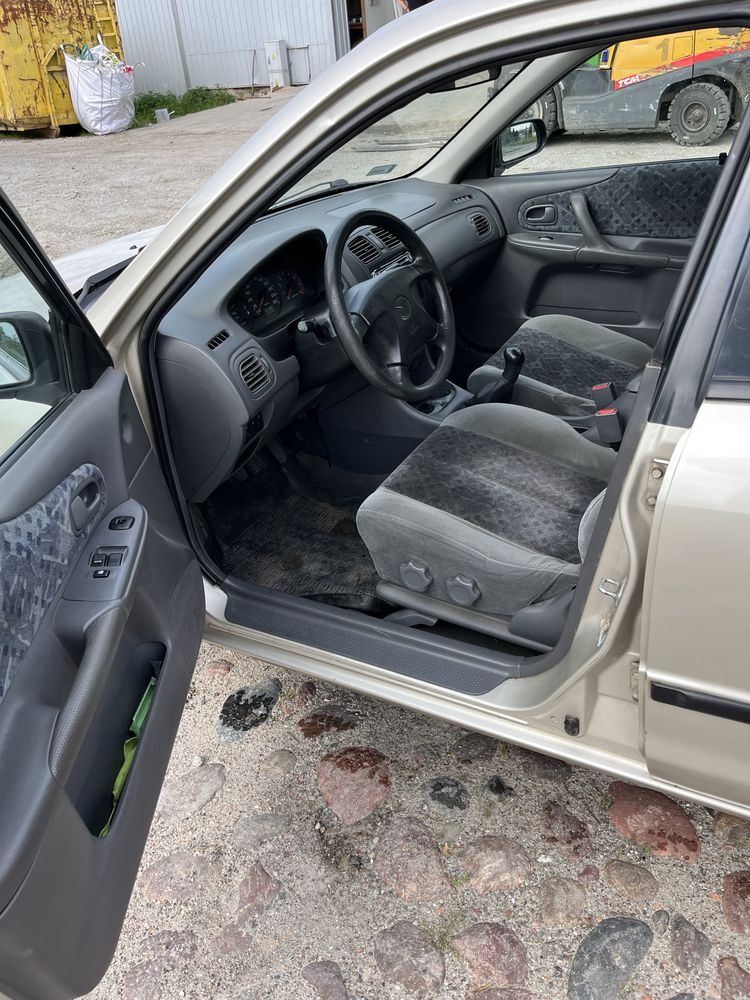 Mazda 323 1,5 benzyna rok 99