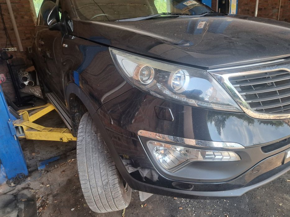 Kia Sportage 3 10-14 бампер передній в зборі Колір кузова 1K - BLACK