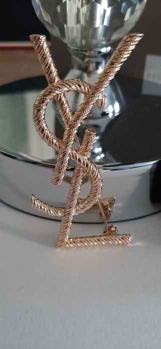 Złota broszka ysl model Opyum Cudo lv cc