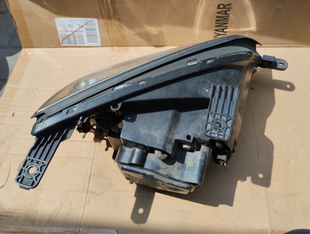 Lampa przednia lewa opel Antara xenon