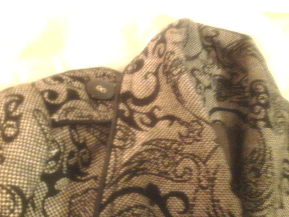 Casaco tipo gabardina, com motivos personalizados