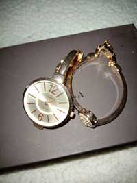 Conjunto de relógio e pulseira em aço