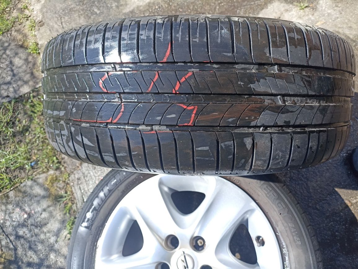 Kola kpl. Opel 5*115 felga 16"+kołpak opony 205 55.16 Michelin hankook