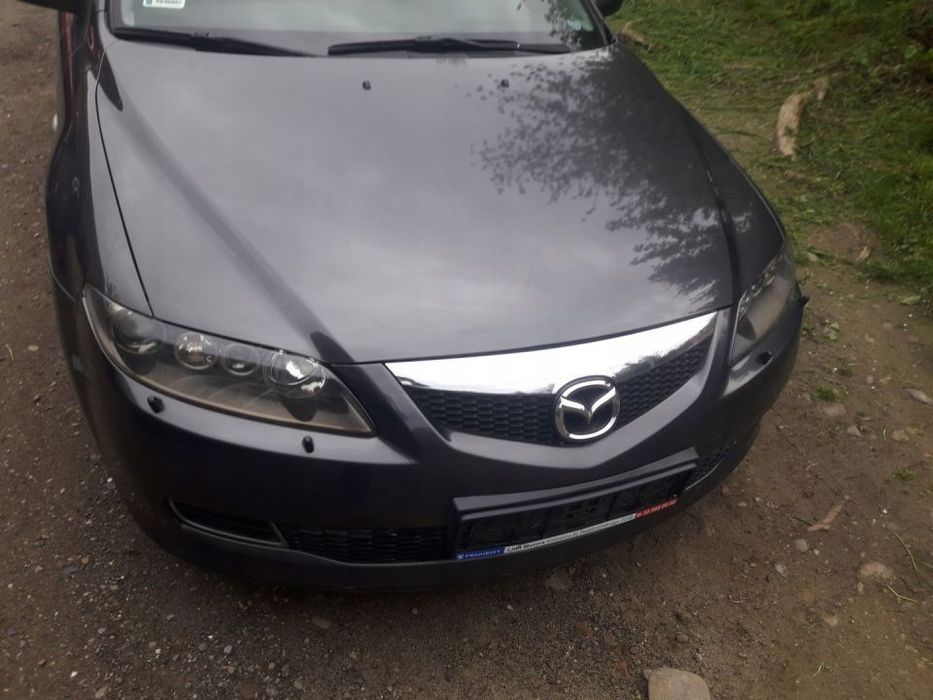 Mazda 6 02-07 Maska lampa zderzak pas atrapa 32G