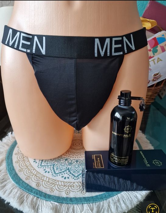 Seksowne męskie stringi z szerokim gumowym pasem i nadrukiem.