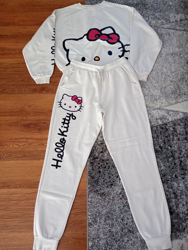 Paka ubrań dla dziewczynki w rozmiarze 146/158/164 cm.