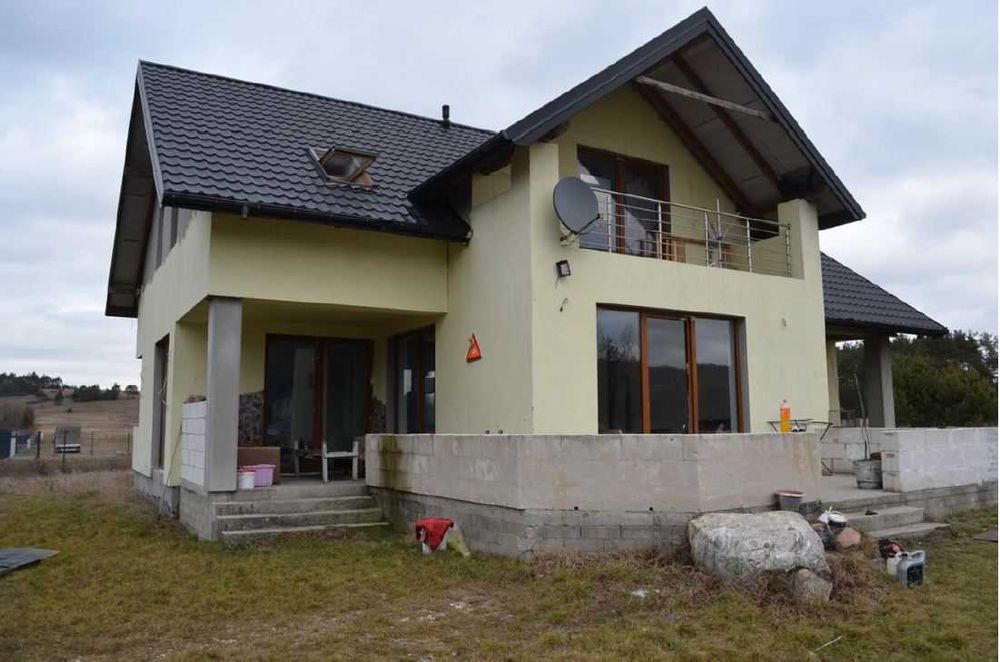 Nieruchomość gruntowa zabudowana budynkiem mieszkalnym o pow. 153,50m2