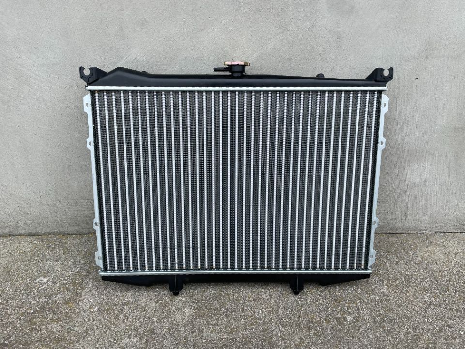 CHŁODNICA WODY NISSAN PICK UP, KING CAB D21 86-- NOWA 2,4i12V