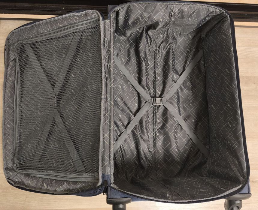 Чемодан бошьшого размера на колесах, валіза для подорожей тканина