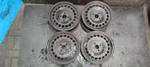 FELGI STALOWE 4x100 6Jx15 CALI ET39  OPEL CORSA ASTRA Komplet