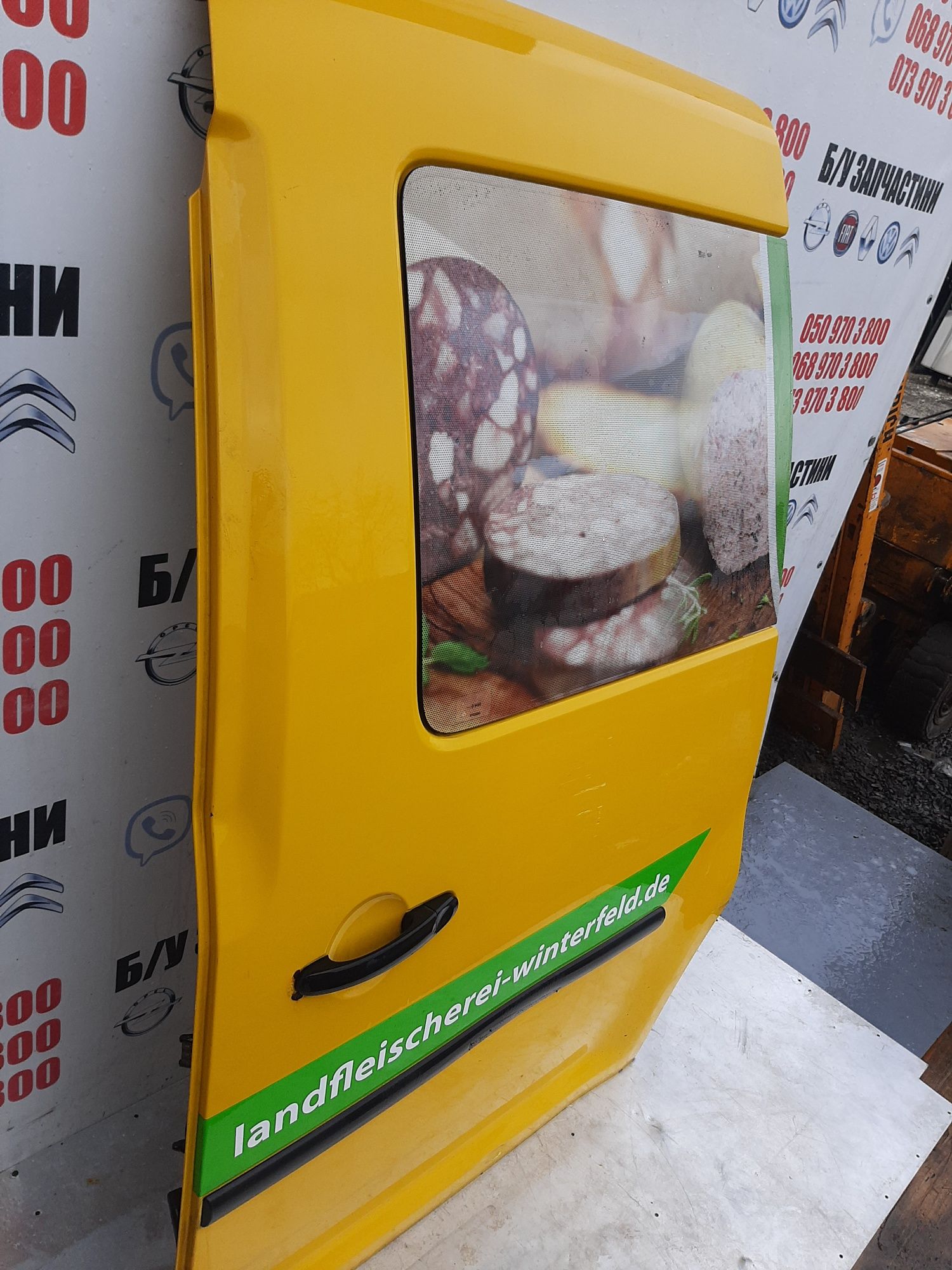 Дверка бокова ліва WV Caddy зі склом