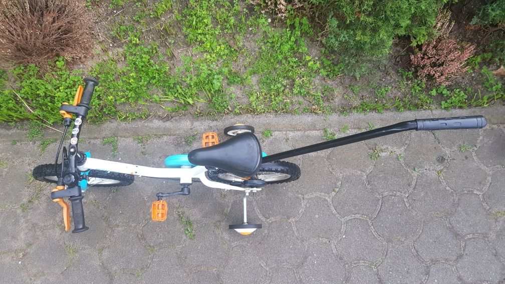 Rowerek dla dzieci z kółkami bocznymi i pałąkiem