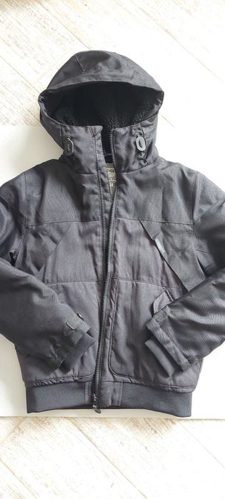 Тепла куртка next