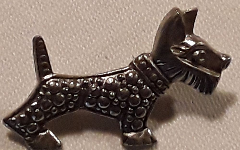 Pregadeira antiga Fox Terrier