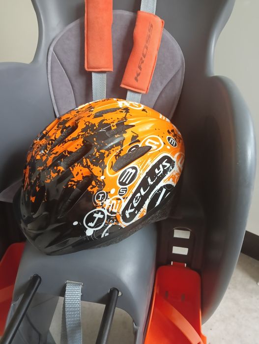 Fotelik rowerowy Kross z kaskiem