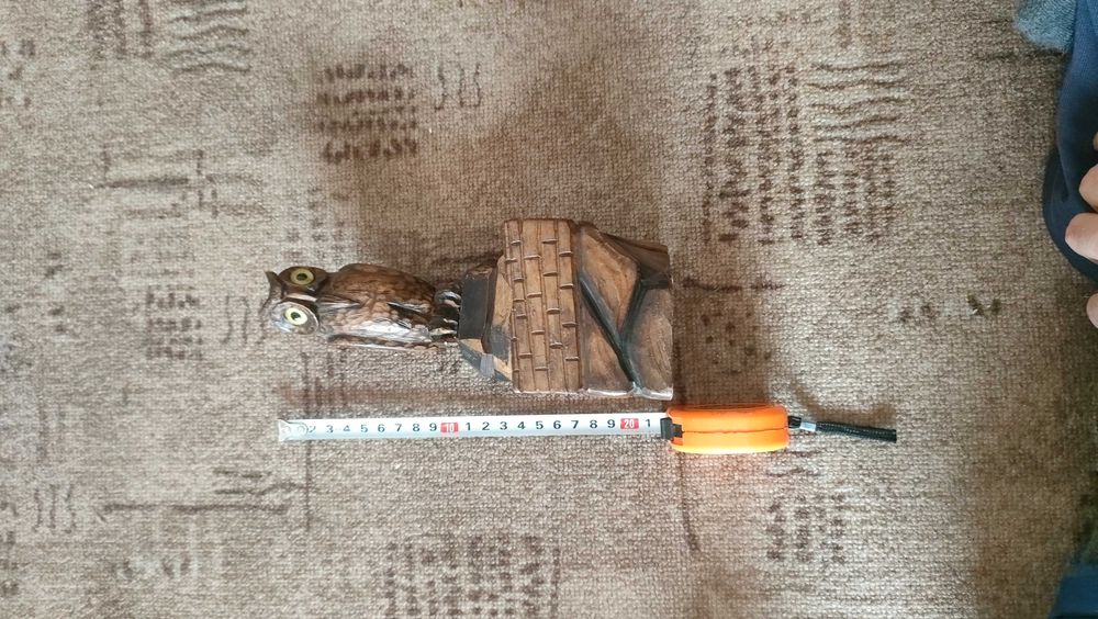 Stara drewniana popielniczka z sową.