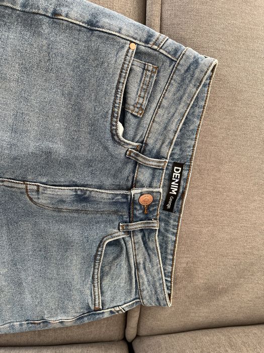 Джинси кльош з розрізом М 46