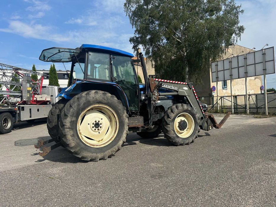 Ciągnik New Holland TM 130 z ładowarką czołową (TUR) - Import z Belgii