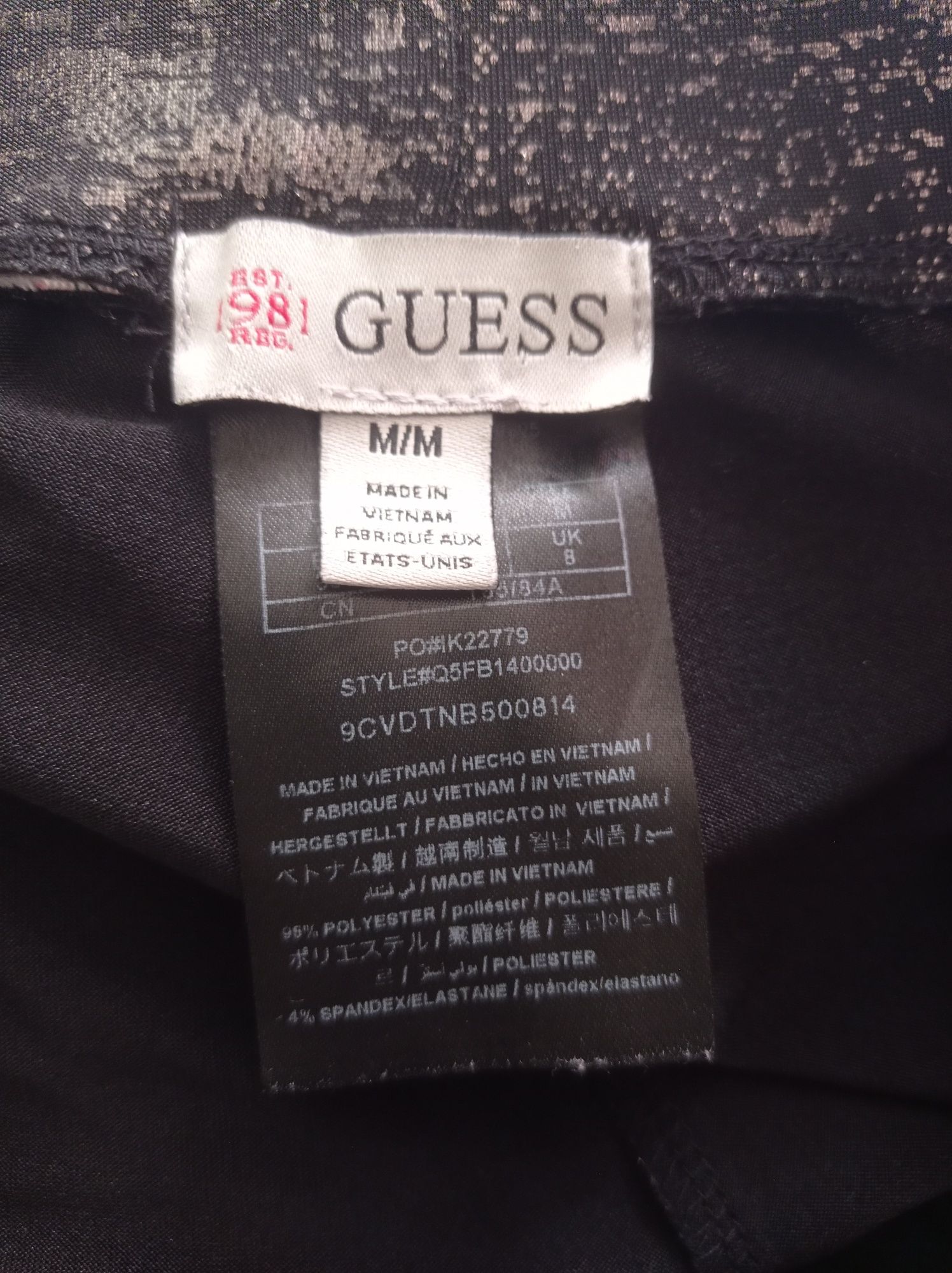 Czarno-srebrne legginsy Guess - rozmiar M.