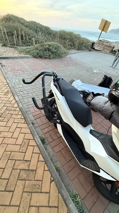 Suporte de prancha para moto.