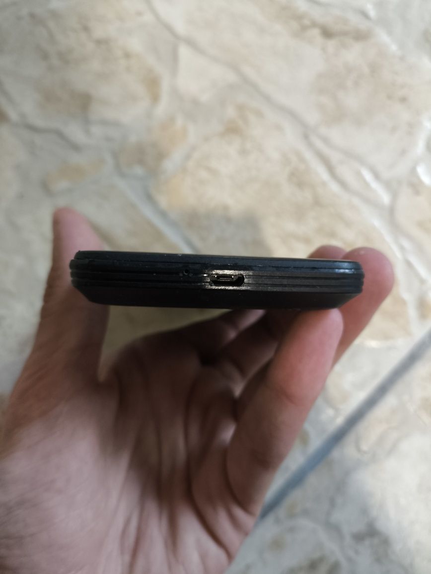 Telemóvel Homtom S99 com capa e carregador